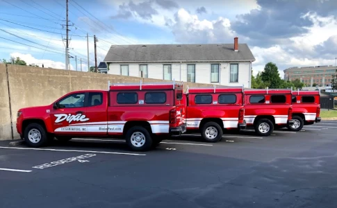 Dixie Exterminators service trucks for local home services